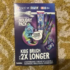 3081642954 ORAL B Crest Holiday Pack Brushes Toothpaste Pouch