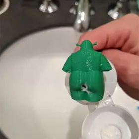 744110557787 TURBO-ROOFINDS Shrek Pooping Toothpaste Topper #3