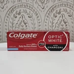 Colgate Optic White Toothpaste With Charcoal Cool Mint Paste 4.2 Oz. Fixed Price $9.49.