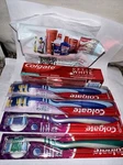 Colgate Optic White 2 Oz Toothpaste - And 4 Pack Zig Zag Toothbrush. Fixed Price $26.96.
